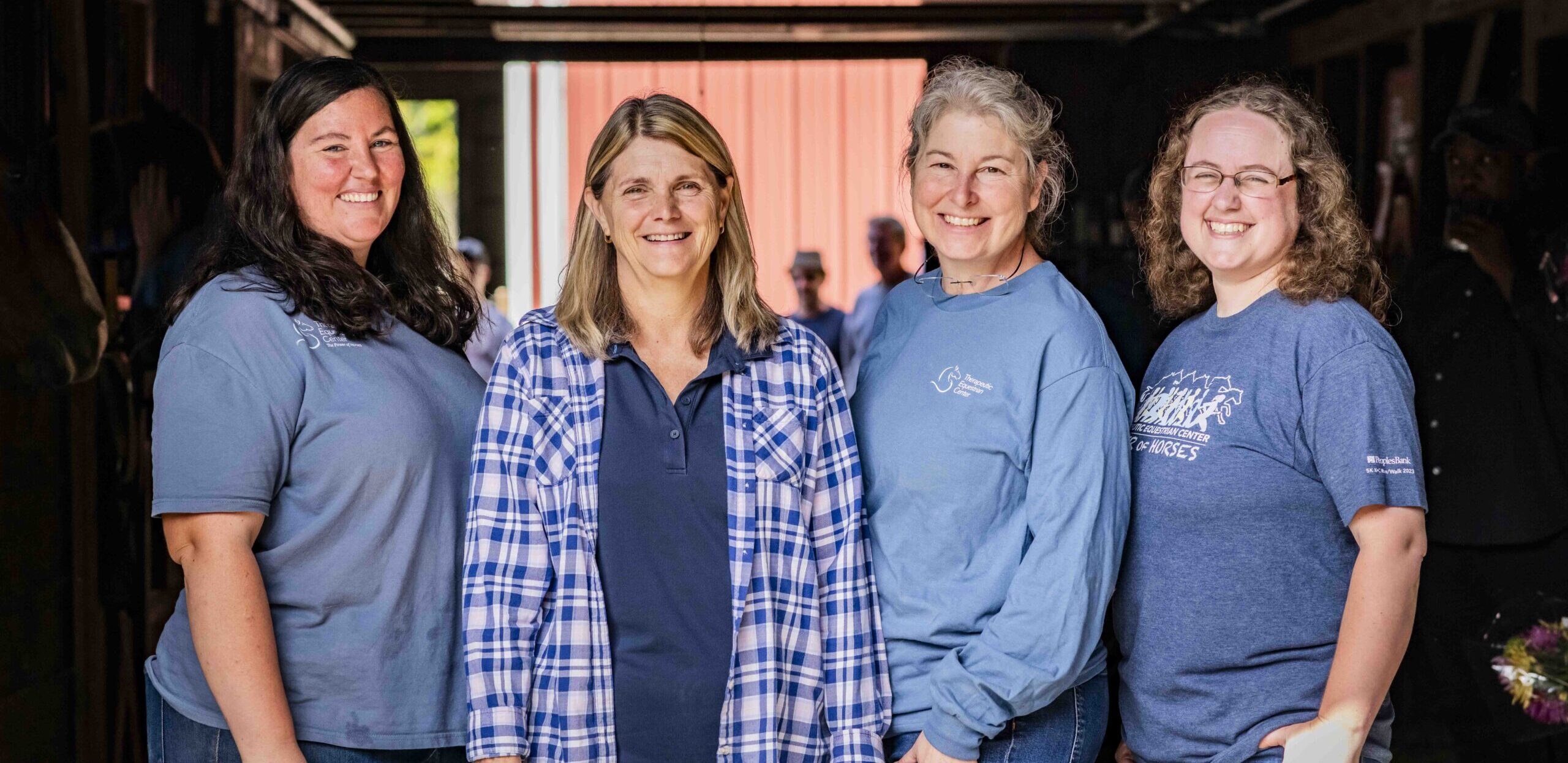 TEC's PATH Intl. Certified Therapeutic Riding Instructors (CTRI) that offer equine-assisted services (EAS) profession who provide riding instruction of therapeutic value to people with disabilities in the barn in Holyoke, MA.